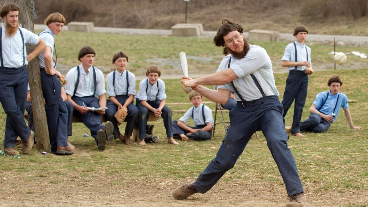 A group of Amish males playing baseball