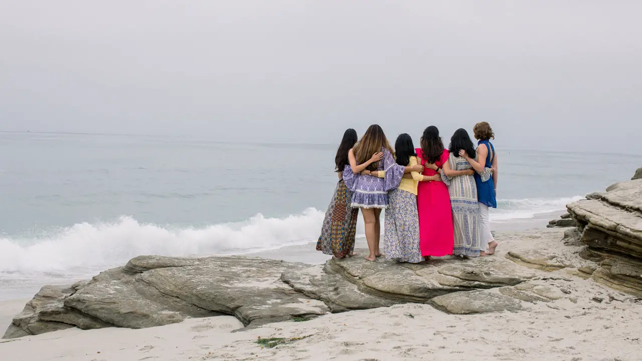 Group of women enjoying the view of the shore in San Diego