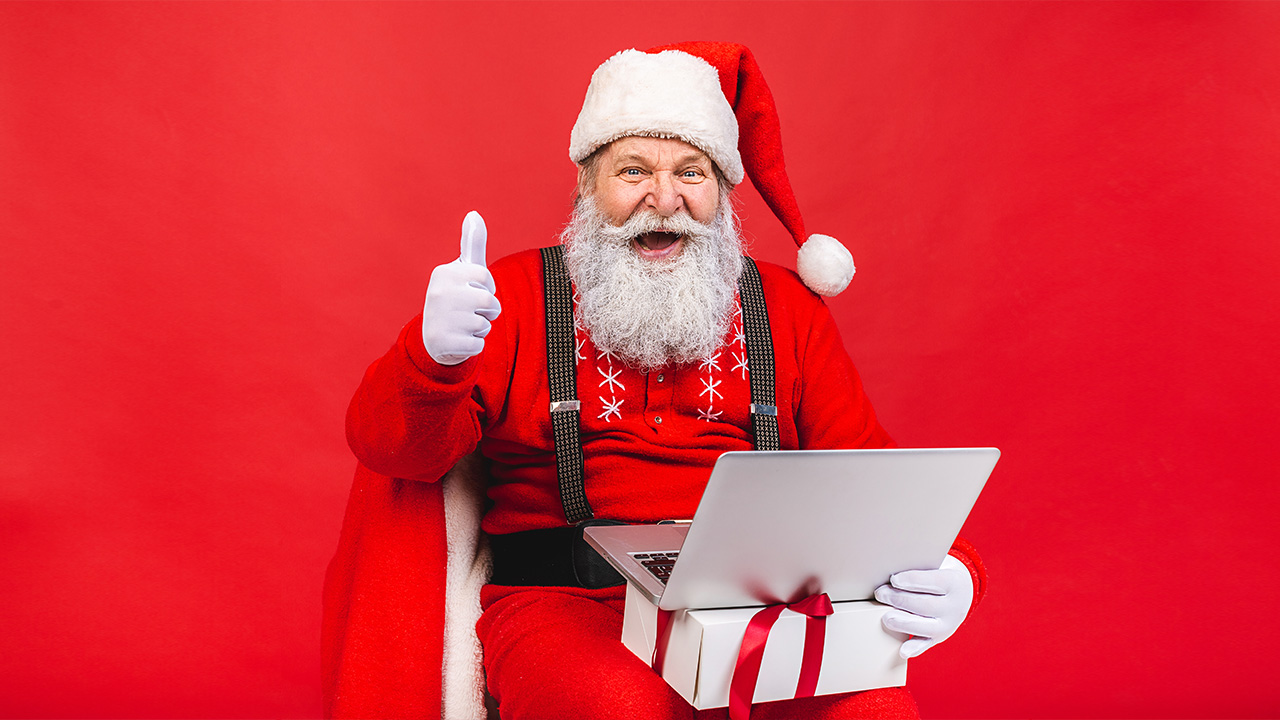 Santa on his laptop checking his list twice!