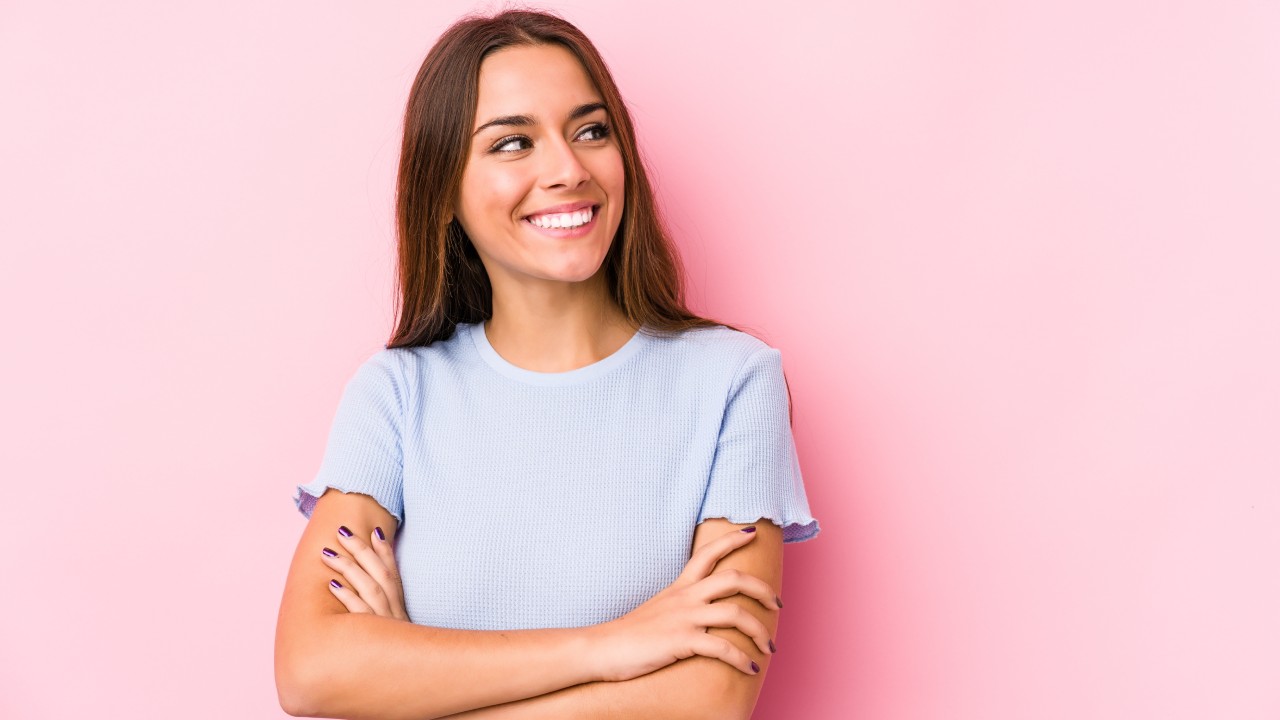 Over confident woman smiling