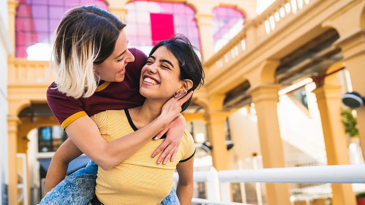 Lesbian couple on a date and out at town having fun