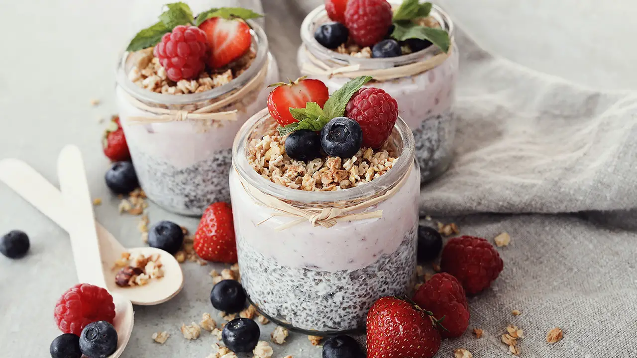Yogurt with chia seed berries glasses