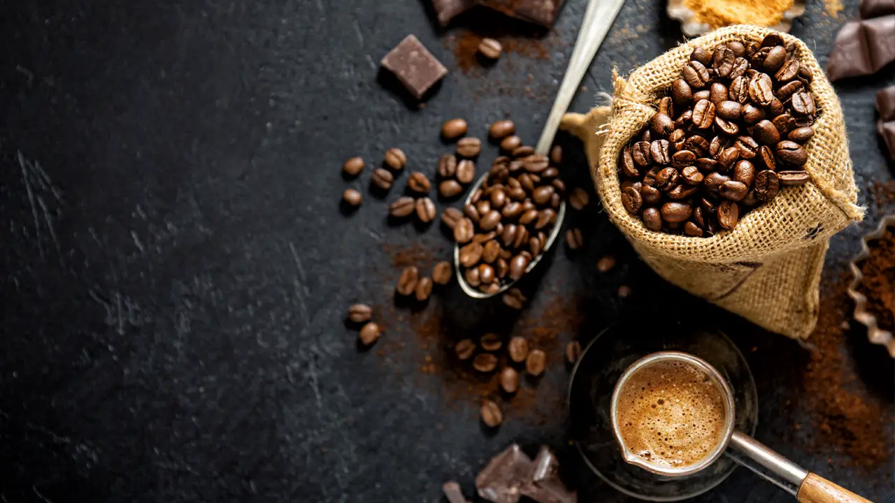 Coffee beans with props for making coffee