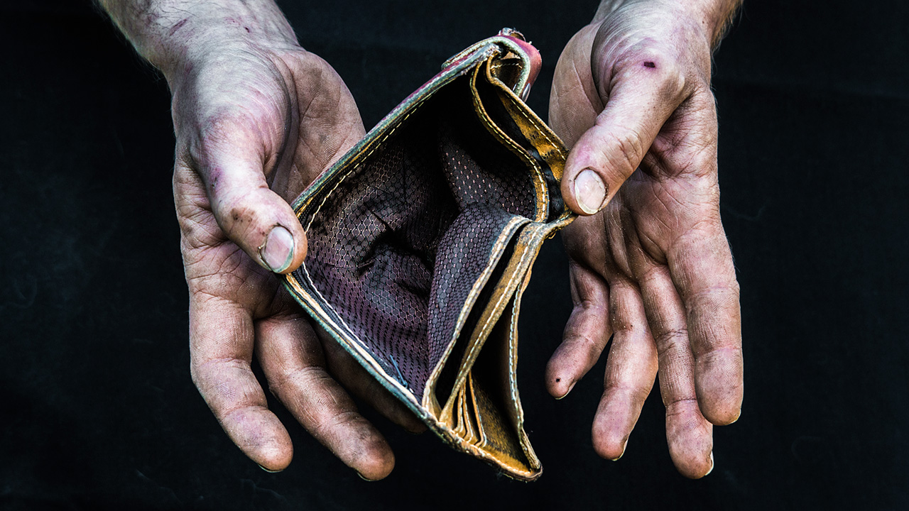 Dirty hands homeless poor man with empty wallet