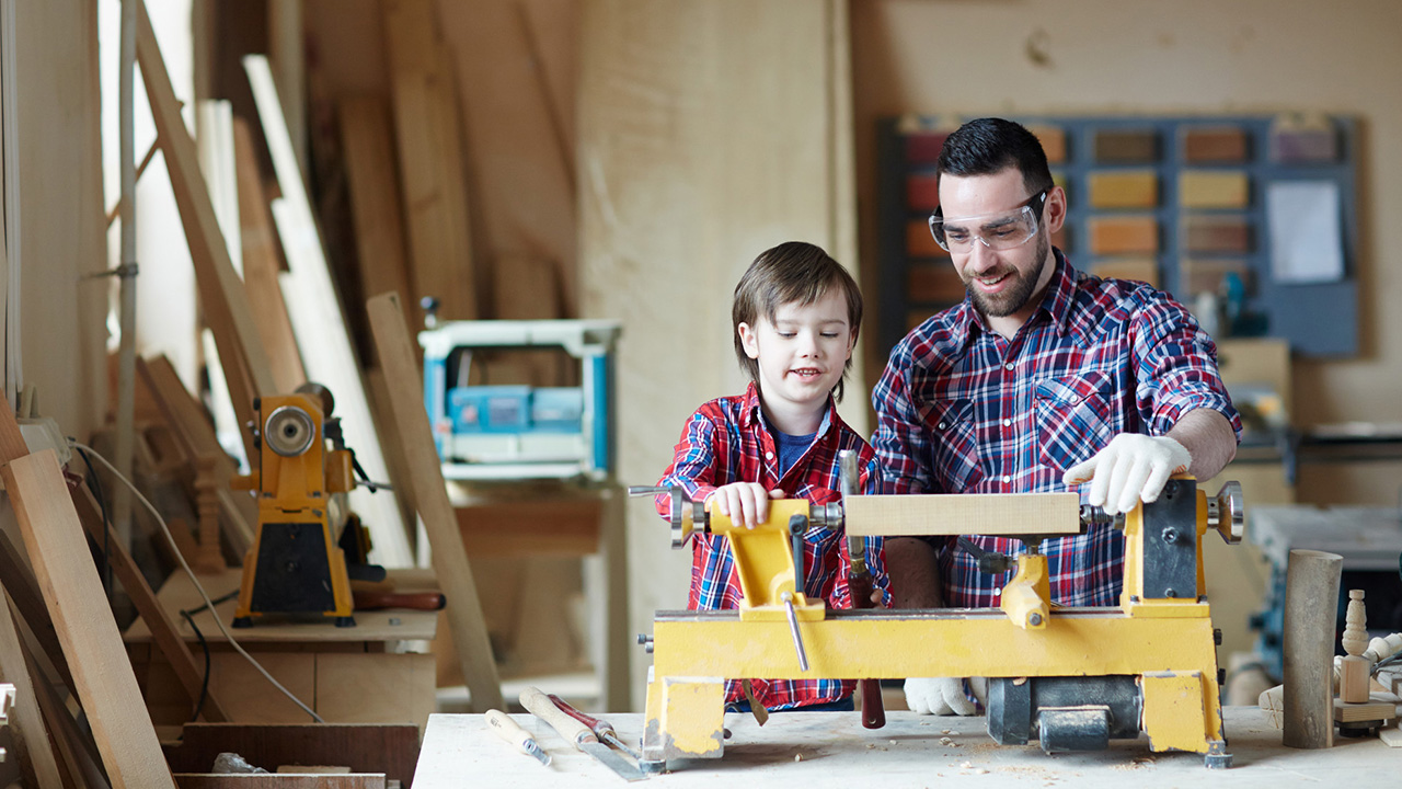 Father and son on a woodworking project