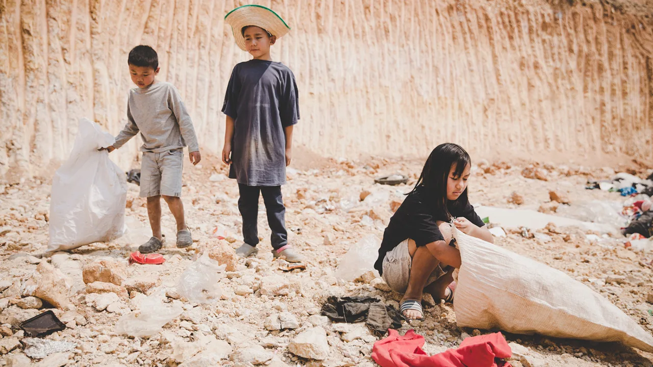 Homeless children at landfill looks forward with hope