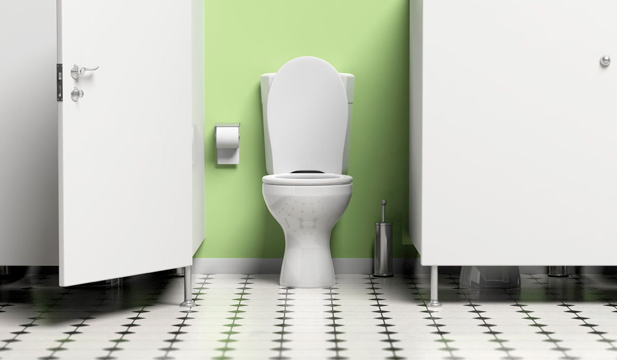 Water closet with open door and white toilet bowl